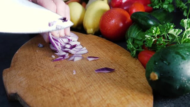 Cutting the onion into small pieces