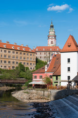 Obraz premium Cesky Krumlov in sunny day with building reflection in the river