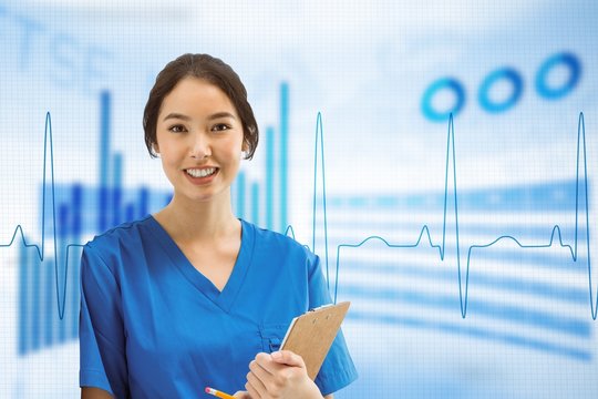 Composite image of asian nurse with stethoscope looking at the