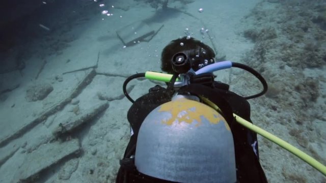 Scuba diver exploring a coral reef in Key Largo, Florida