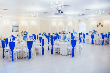 hall for wedding with tables and decoration
