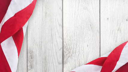 Fototapeta na wymiar American Flag Over Whitewashed Wood Background For United States Holidays