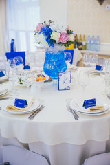 hall for wedding with tables and decoration