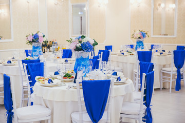 hall for wedding with tables and decoration