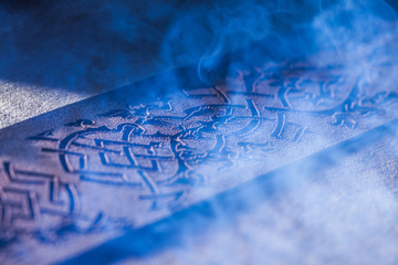 Fototapeta premium Laser makes engraving on leather belt 