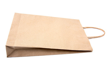 Brown paper shopping bag isolated on white background.Brown paper bag isolated