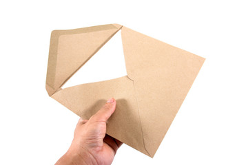 Fototapeta premium Brown document envelope and white paper with hand holding isolated on white background