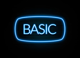 Basic  - colorful Neon Sign on brickwall