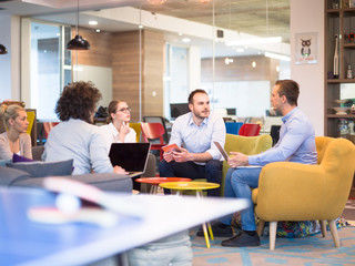 Startup Business Team At A Meeting at modern office building