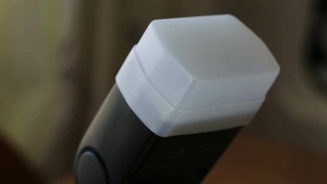 Flashing the built-in flash on the DSLR camera. Close-up