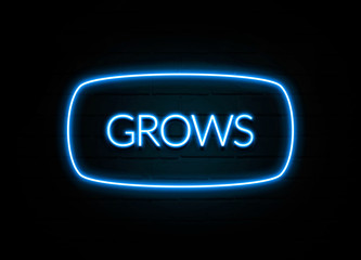 Grows  - colorful Neon Sign on brickwall