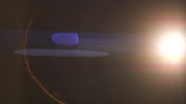 The warm light on the dark background. anamorphic lens flare