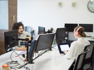 businesswoman using a laptop in startup office