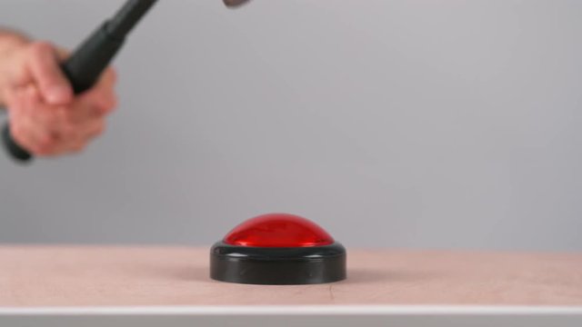  Angry person hitting red game show buzzer with hammer in super slow motion