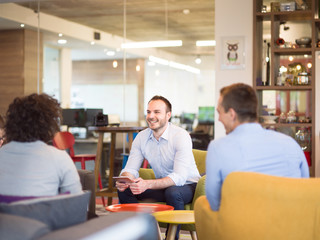 Startup Business Team At A Meeting at modern office building