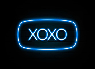 Xoxo  - colorful Neon Sign on brickwall