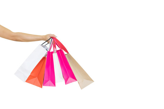 Female walks hands holding shopping bags and credit card white background Clipping path
