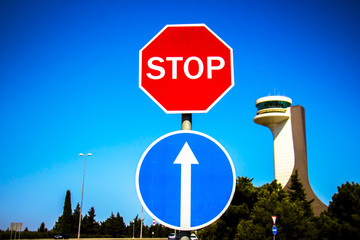 Stop sign on blue sky
