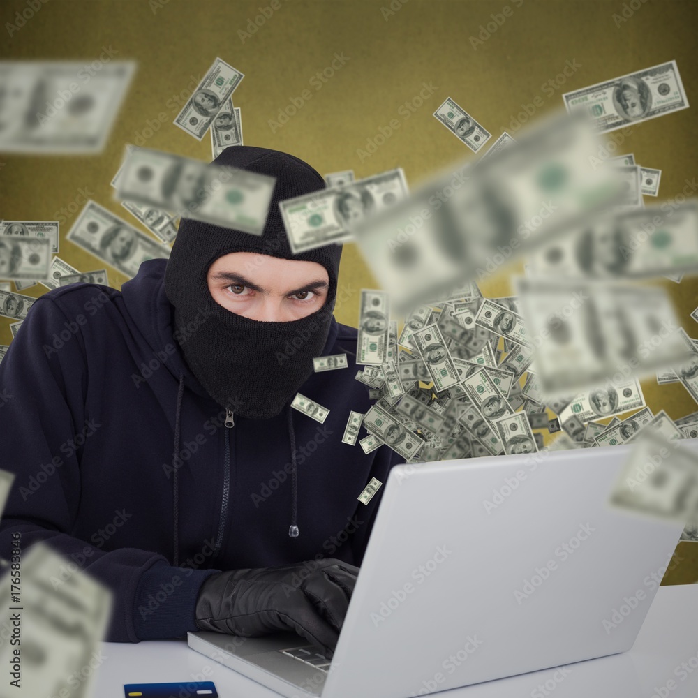 Poster composite image of hacker in balaclava hacking a laptop