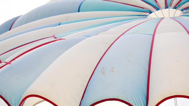 Abstract of blue and white parachute or parasailing in transport and travel concept.