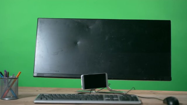  Cell phone thrown at computer screen in a rage, shot in super slow motion