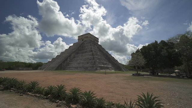 Panoramic view around high Maya pyramid temple on Yucatane peninsula in summer sunny day