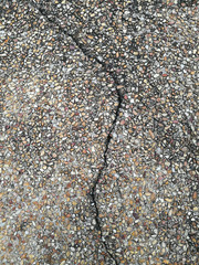 Cracked cement gravel stone texture