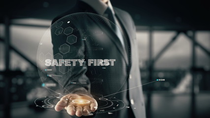 Safety First with hologram businessman concept