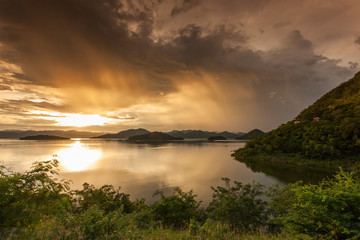 Natural view after the rain so beautiful with sunrise and reflection on the lake