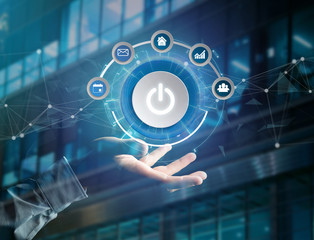 Power button symbol with computer app displayed on a futuristic interface