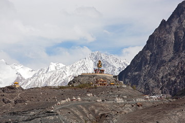 Giant Buddha Maitreya sitting statue in Nubra valley against the backdrop of the Himalayan mountains