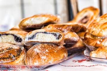Closeup of stack of many fresh poppy seed rolls sweet bun bread Ukrainian baked good