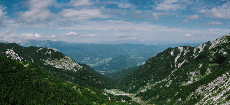 Panoramic view of the valley Planina Suha. Summer in Julian Alps, Bohinj, Slovenia, Europe.