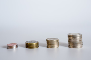 Korean coin stacks on a white background.