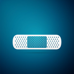Medical bandage plaster icon isolated on blue background. Flat design. Vector Illustration