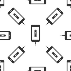Smartphone battery charge icon seamless pattern on white background. Phone with a low battery charge and with USB connection. Flat design. Vector Illustration