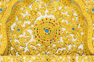 Pattern of flower gold wall stucco carved