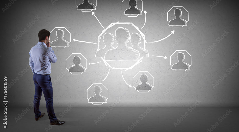Aufkleber businessman watching social network sketch on a wall 3d rendering