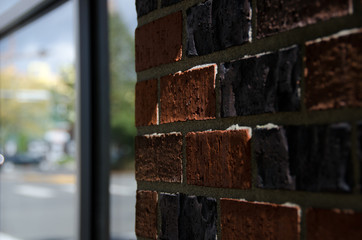 Red brick wall and tall window