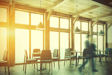 Wooden cafe interior, windows side toned