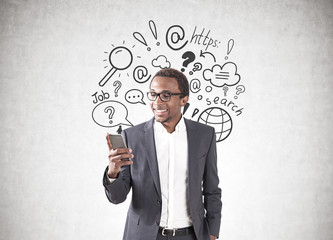 African businessman, smartphone, internet search
