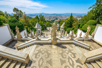 The monumental baroque staircase of Bom Jesus do Monte Sanctuary, a popular pilgrimage destination with panoramic views overlooking Braga cityscape from top of mountain. Tenoes in north of Portugal. © bennymarty
