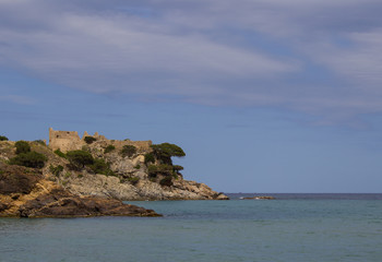 Fototapeta na wymiar Island in the sea with an ancient ruined fortress, Spain, Catalonia