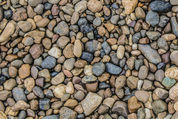 Road of multi-colored stones of a round shape background image