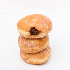 Homemade donuts isolated on white background.