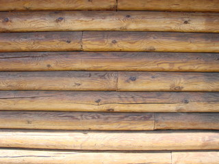 Obraz premium Shield with a large number of parallel wooden logs texture