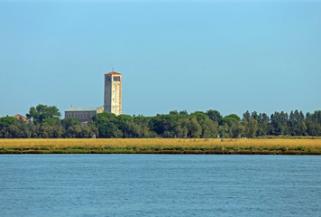 ancient bell tower of the Cathedral of Santa Maria Assunta in th