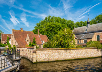 Fototapeta na wymiar Bruges (Brugge) cityscape with water canal