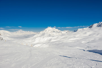 Alpine winter mountain landscape. French Alps with snow.