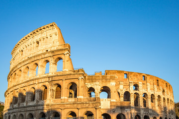 Fototapeta na wymiar View of Colosseum and sunset in Rome, Italy